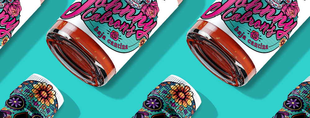 Johnny Cabrón's Baja Cantina hot sauce bottle with colorful Dia de los Muertos label art